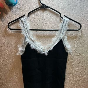 Black and white vest